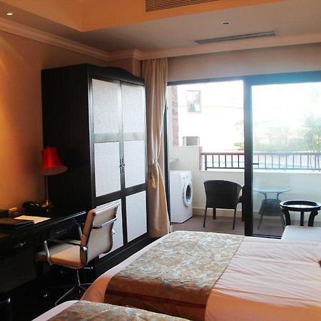 Tangla Suites Hotel Yalong Bay Sanya Kamer foto
