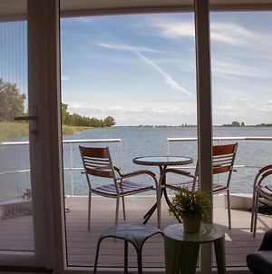 Houseboat uitzicht over veluwemeer, natuurlokatie, prachtige vergezichten Hotel Biddinghuizen Exterior photo