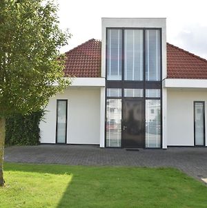 Holiday Home In Zeewolde With Jetty Next To Golf Course Exterior photo