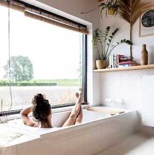 Bathtub With View Holiday House Near The Lake By Familie Buitenhuys Villa Venhuizen  Exterior photo