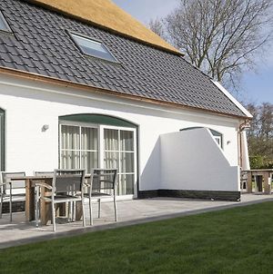 Spacious Farmhouse in De Cocksdorp with Private Terrace Exterior photo